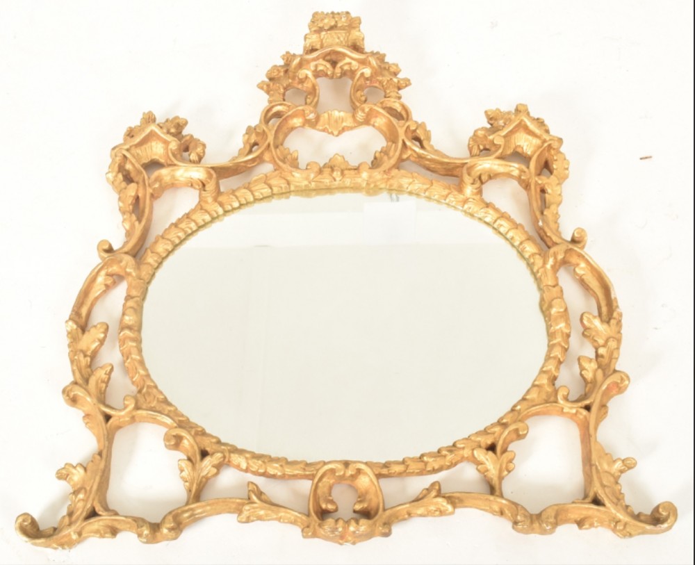 carved giltwood wall mirror