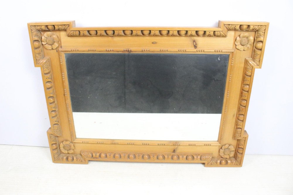 c19th pitch pine carved frame with a mirror