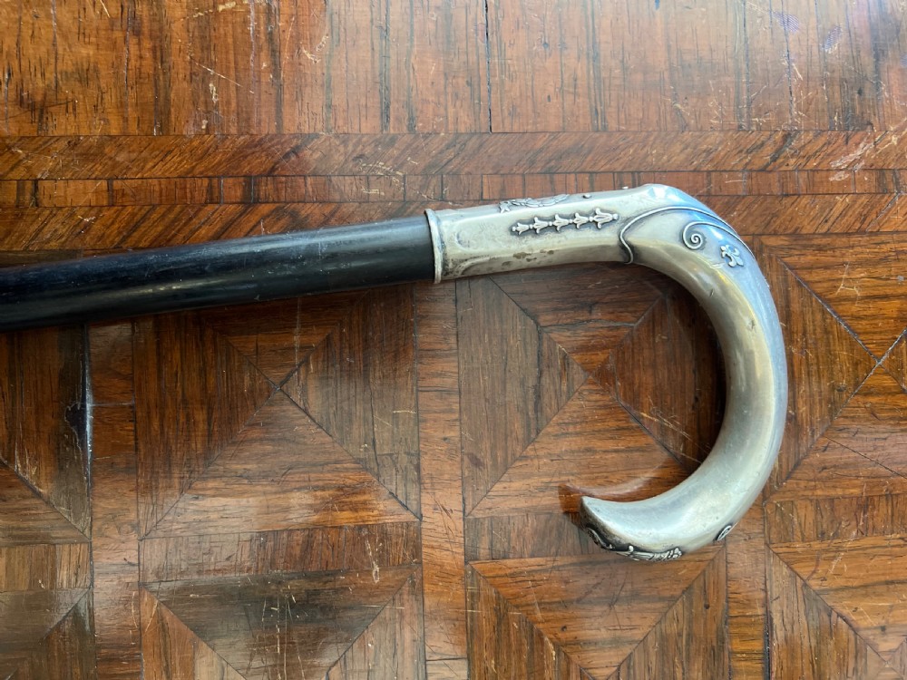 embossed silver handled walking stick