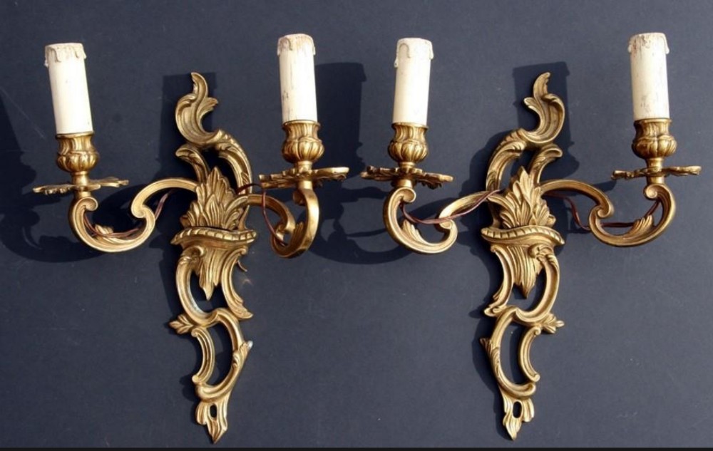 pair of gilt metal rococo wall lights