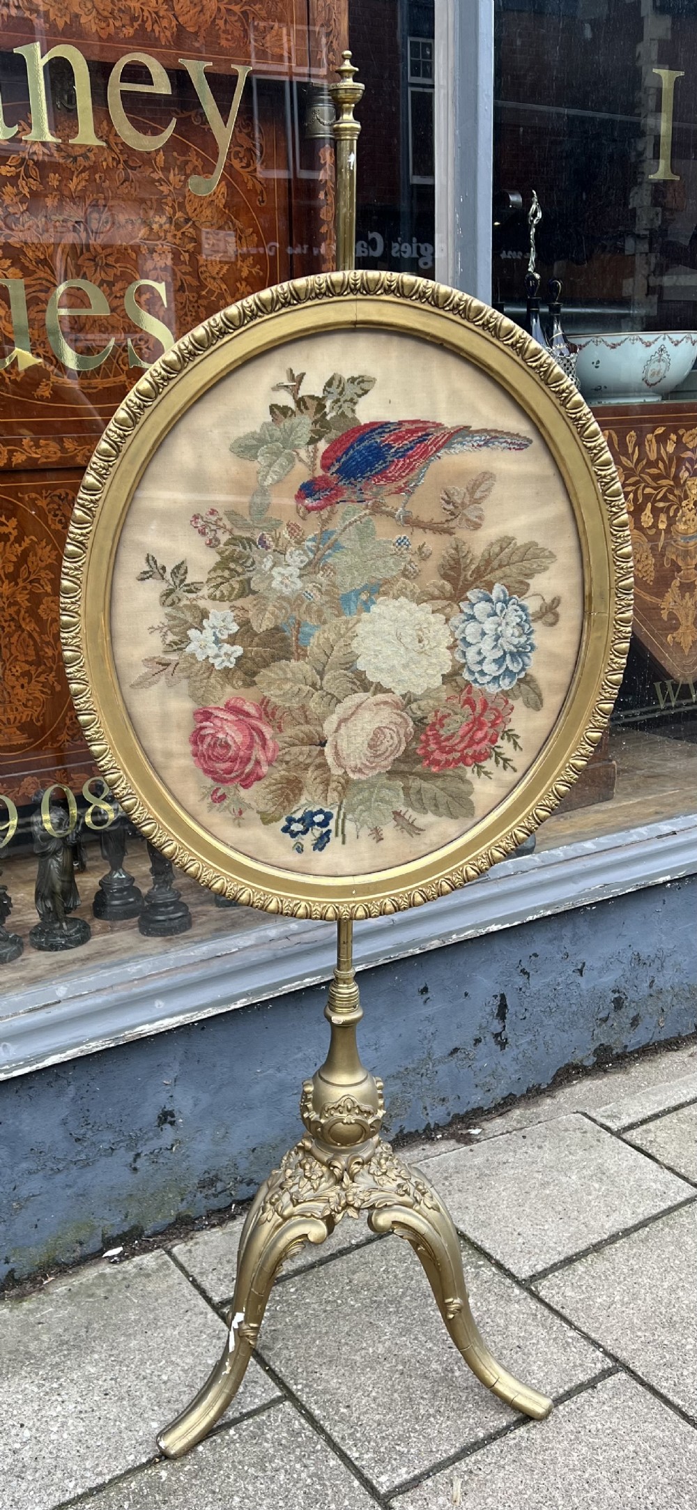 c19th gilded pole screen with large oval embroidery