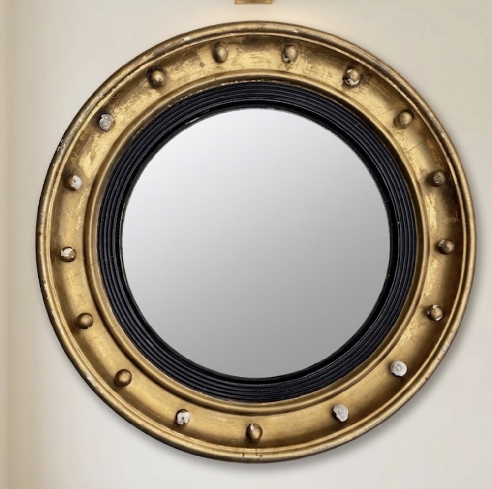 large c19th convex mirror with ebonised slip