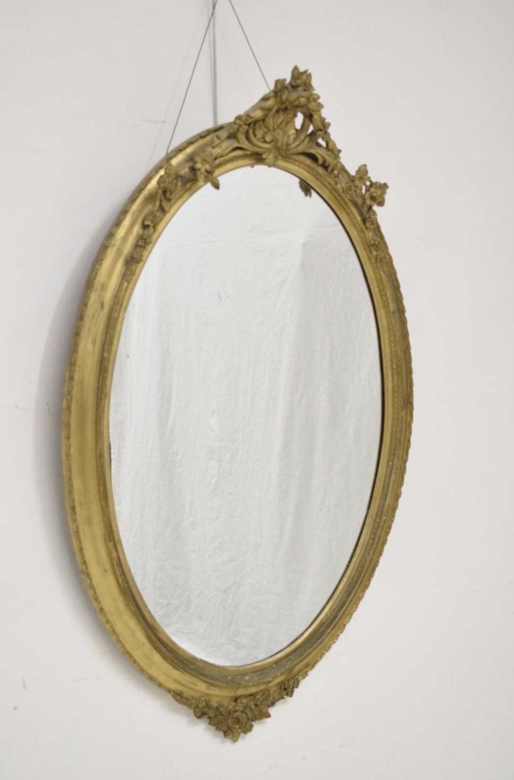 large giltwood and gesso oval mirror