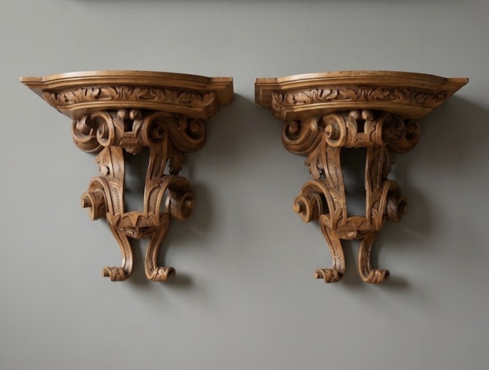 pair of georgian carved walnut wall brackets