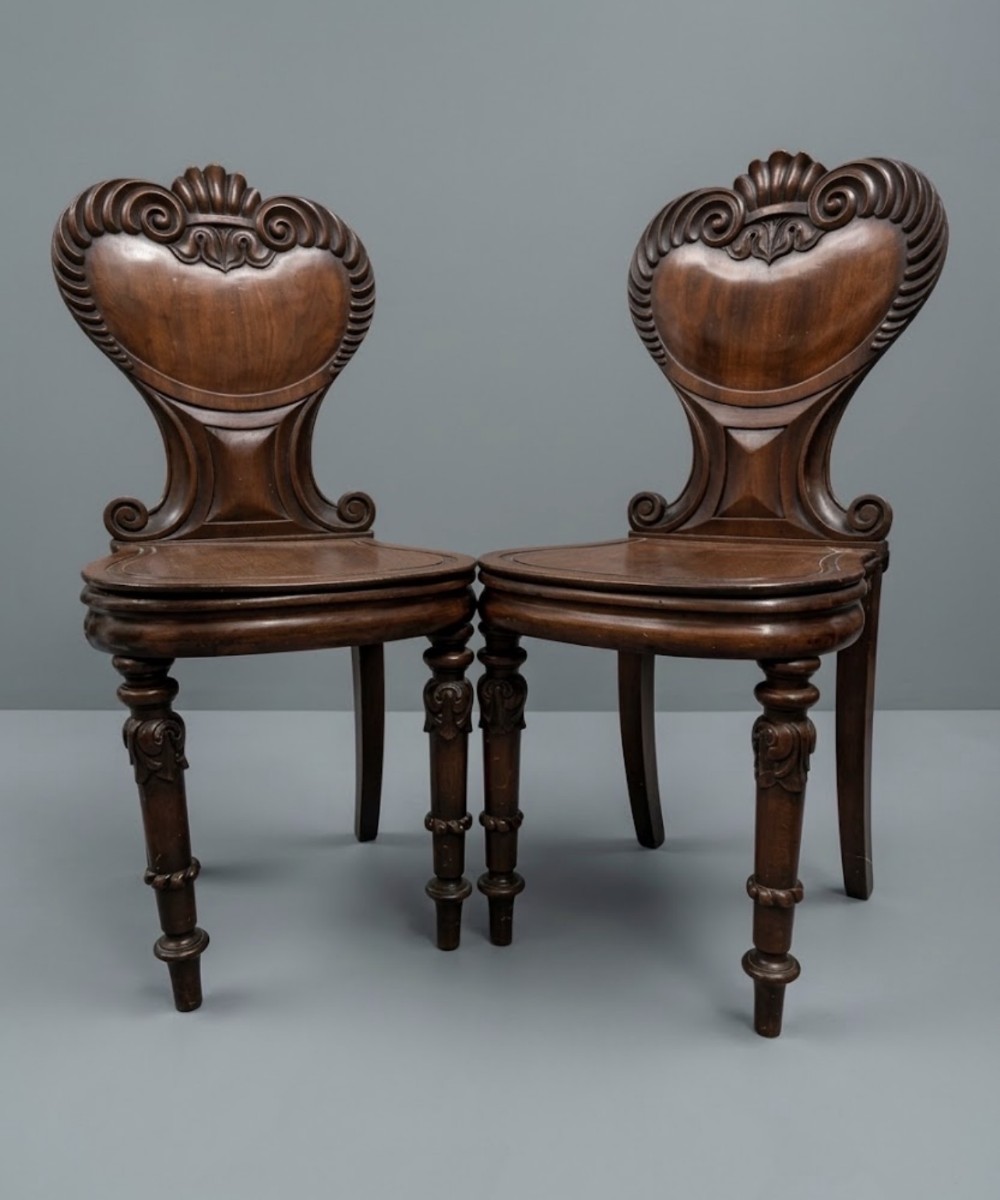 pair of mahogany sheild back hall chairs